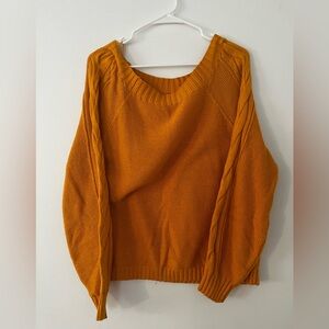 Orange knitted sweater